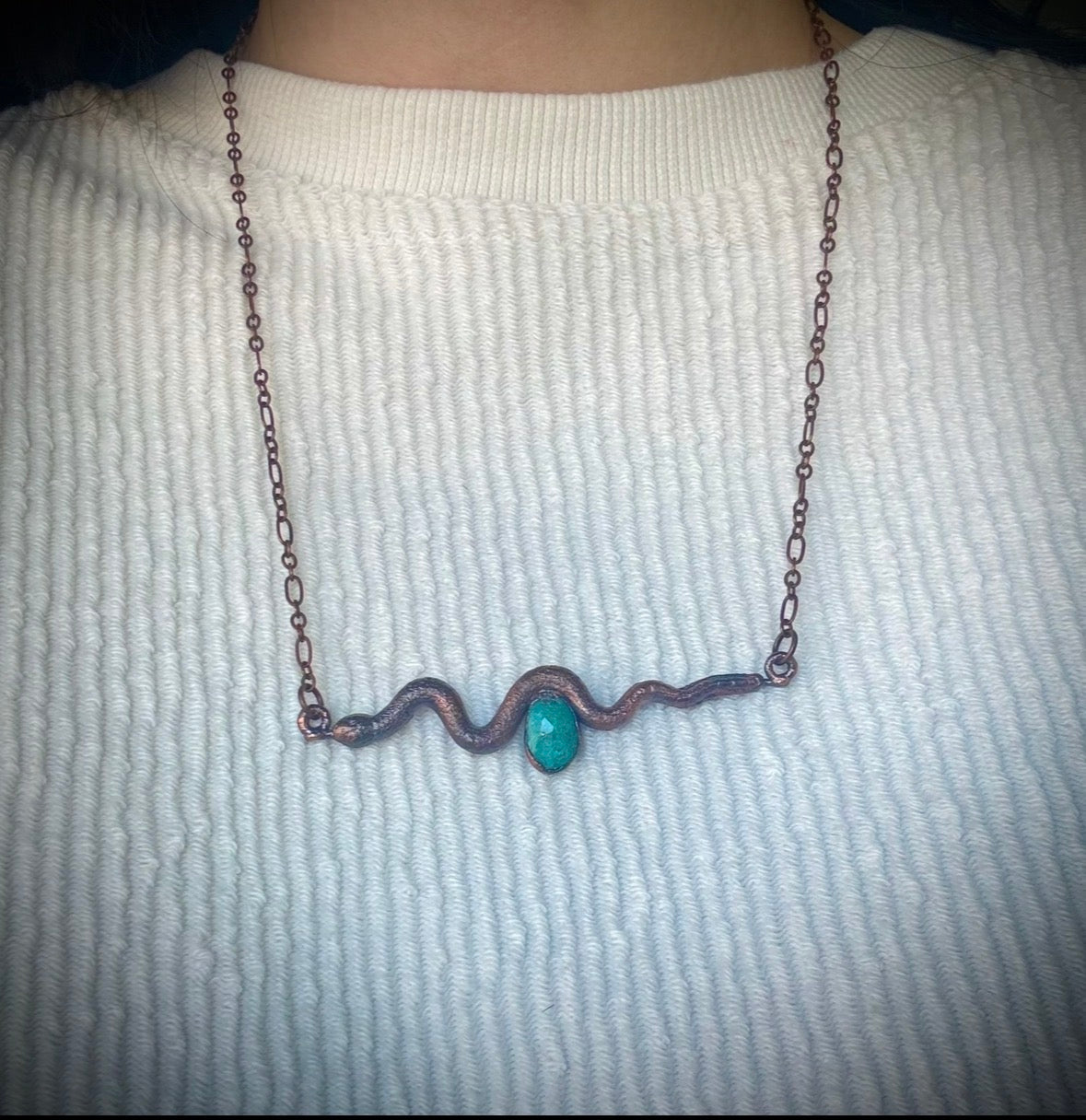 Turquoise stone and snake.