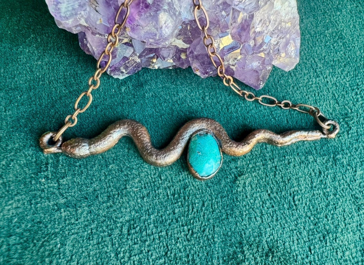 Turquoise stone and snake.