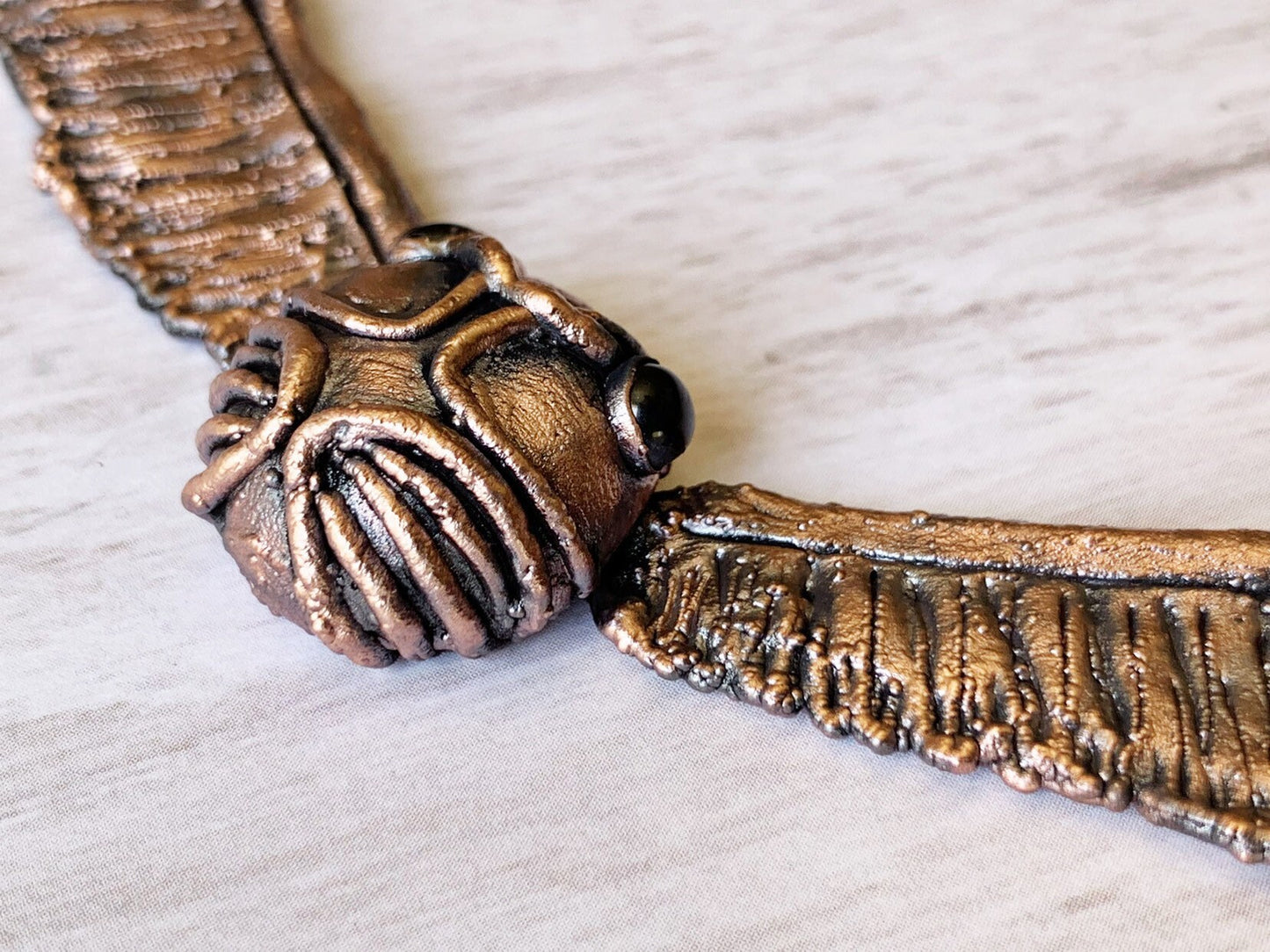 “Golden snitch” necklace