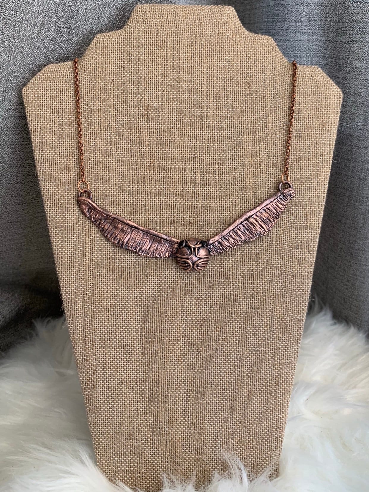“Golden snitch” necklace