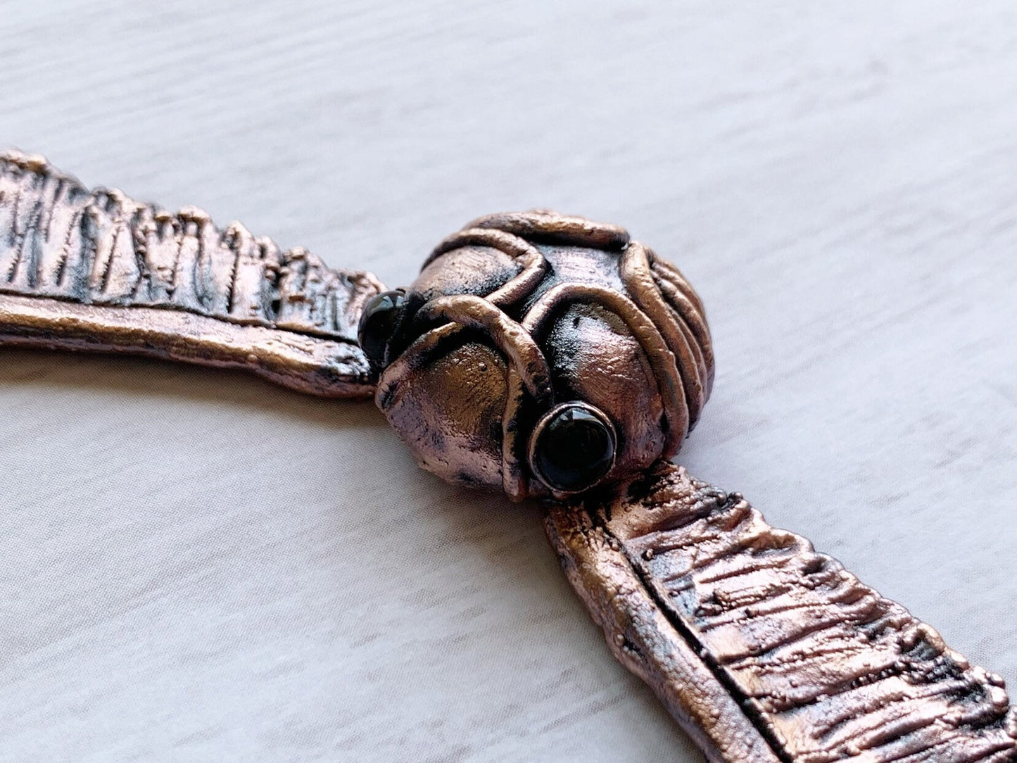 “Golden snitch” necklace