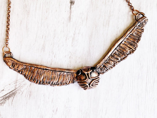 “Golden snitch” necklace